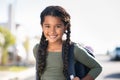 Smiling elementary school girl with bagpack Royalty Free Stock Photo