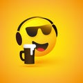 Smiling Emoticon Listening to Music - Face Wearing Sunglasses, Headphones and Frothy Beer in a Mug on Yellow Background Royalty Free Stock Photo