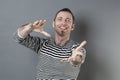 Smiling energetic 40s man grabbing something Royalty Free Stock Photo