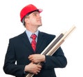 Smiling engineer with hard hat and blueprints Royalty Free Stock Photo