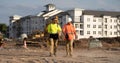 smiling engineer men at construction site outdoor. photo of engineer men at construction site. Royalty Free Stock Photo