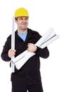 Smiling engineer with rolls of paper in hand Royalty Free Stock Photo