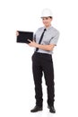 Smiling engineer showing a digital tablet. Royalty Free Stock Photo