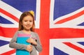 Smiling English schoolgirl with textbooks Royalty Free Stock Photo