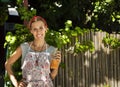 Smiling entrepreneur outisde her juice shop. Copy space Royalty Free Stock Photo