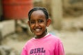 A smiling Eritrean girl looks towards the camera, on the outskirts of Asmara, Eritrea.