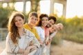 Smiling european multi-generation family have fun, enjoy walk, vacation in city park at weekend together Royalty Free Stock Photo