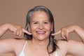 Smiling european senior grey-haired lady enjoy natural skin beauty, lifestyle, spa procedures result Royalty Free Stock Photo