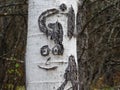 A smiling face and accompanying initials tell a brief story of a memory saved deep in the forests of north Idaho years ago