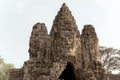 Heads on Temple in Angkor Thom, Khmer Temple, Siem Reap, Cambodia. Old photo style Royalty Free Stock Photo