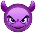 Smiling face with horns emoticon Royalty Free Stock Photo