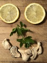 Smiling face made from lemon slices, parsley and dried ginger