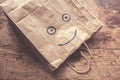 Smiling face on paperbag