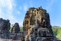 Smiling faces fallen apart on Temple of Angkor Thom, Cambodia. Royalty Free Stock Photo