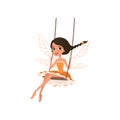 Smiling fairy with magic wings. Cartoon girl character sitting on swing. Pixie in little orange dress. Magical creature