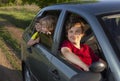 Smiling family with children in the car. Holiday and travel concept Royalty Free Stock Photo