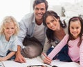 Smiling family drawing together Royalty Free Stock Photo