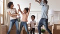 Smiling family with kids dance happy to move Royalty Free Stock Photo