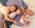 Smiling family with newborn twins Royalty Free Stock Photo