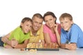 Smiling family playing chess together Royalty Free Stock Photo