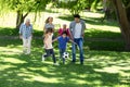 Smiling family playing football Royalty Free Stock Photo