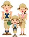 A smiling family of three in expedition clothes