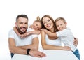 Smiling family in white t-shirts hugging Royalty Free Stock Photo