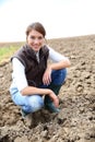 Smiling farmer woman in the fileds Royalty Free Stock Photo