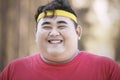 Smiling fat man wears sportswear at autumn Royalty Free Stock Photo