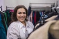 Smiling fat woman in plus size store looking at camera. Royalty Free Stock Photo