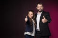 smiling father and daughter showing thumbs up Royalty Free Stock Photo