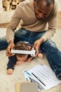 Smiling father entertaining his son Royalty Free Stock Photo