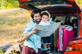 smiling father and toddler son looking at map Royalty Free Stock Photo