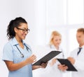 Smiling female african american doctor or nurse Royalty Free Stock Photo