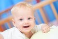 Smiling female baby of three month.