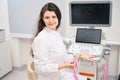 Young doctor sitting near equipment in the hospital Royalty Free Stock Photo