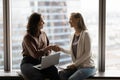 Smiling female employee handshake after successful meeting Royalty Free Stock Photo