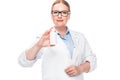 smiling female doctor in eyeglasses showing pill bottle