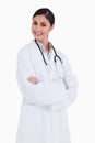 Smiling female doctor with her arms folded Royalty Free Stock Photo