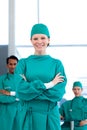 Smiling female doctor with her team Royalty Free Stock Photo