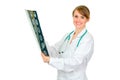 Smiling female doctor holding roentgen Royalty Free Stock Photo