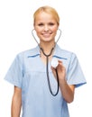 Smiling female doctor or nurse with stethoscope Royalty Free Stock Photo