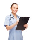 Smiling female doctor or nurse with stethoscope Royalty Free Stock Photo