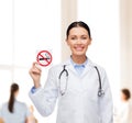 Smiling female doctor with stethoscope Royalty Free Stock Photo