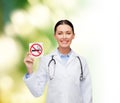 Smiling female doctor with stethoscope Royalty Free Stock Photo