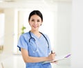 Smiling female doctors working in the office