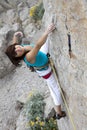 Smiling female extreme climber