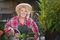 Smiling female gardener