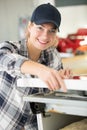 Smiling female handyman working