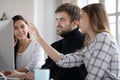 Smiling female male businesspeople working on project. Royalty Free Stock Photo